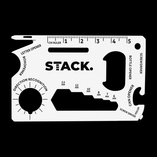 STACK.tool, white card multitool with black markings on black
